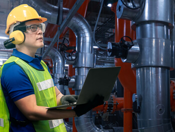 Technician providing analysis for a building system